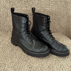 Black combat boots.